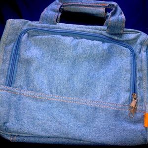 This is a beautiful blue Jean makeup/art purse. Great for makeup or materials.💙